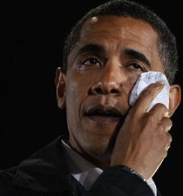 A photo of Barack Hussein Obama wiping away his tears
